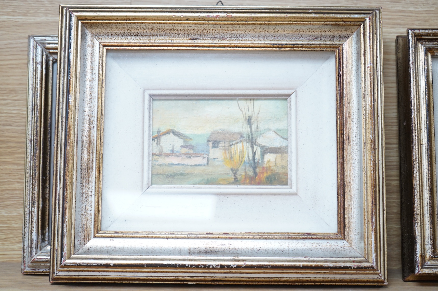 Luigi Buso (Italian), ‘Uno Scorcio Fra Le Nubi’ and three other landscapes, details verso, each signed and dated, set of four oils on canvas board, largest 10 x 18cm